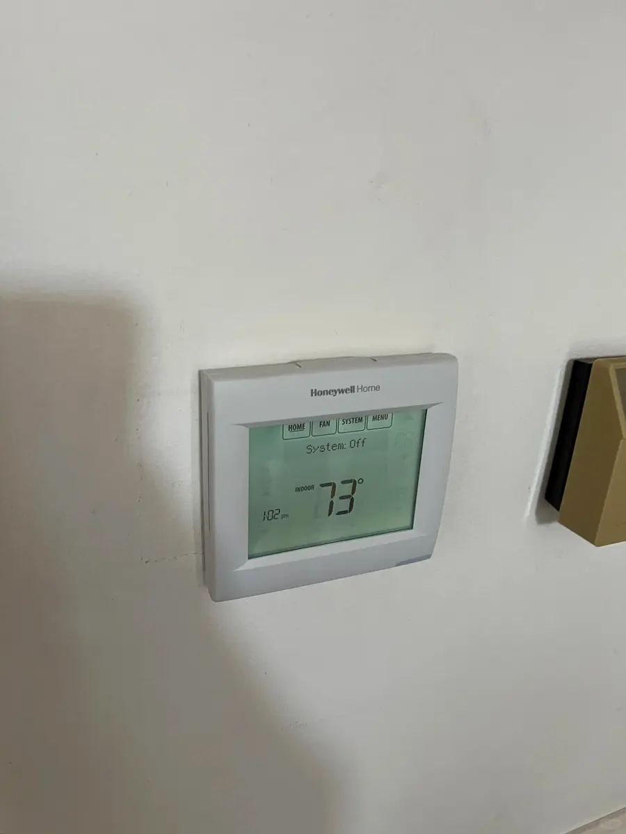 Wall-mounted thermostat control display
